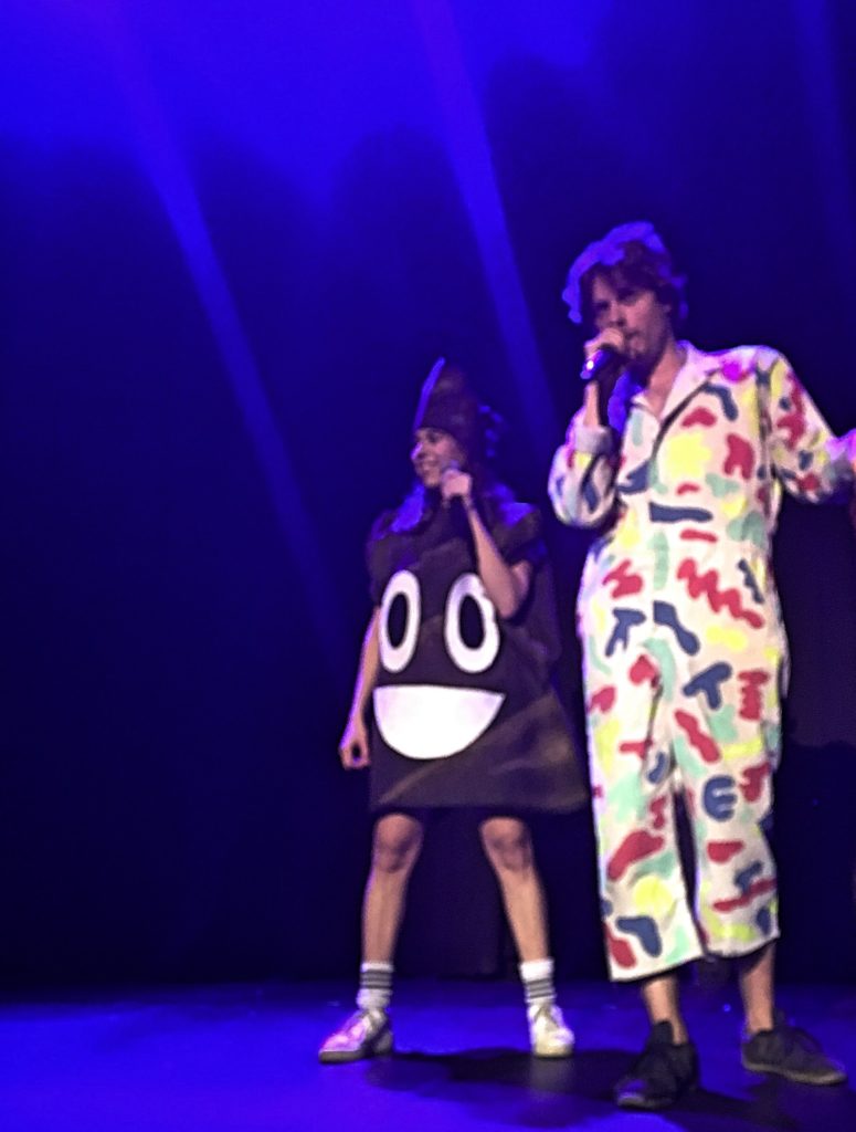  Hila dons a poop emoji costume to promote humanure